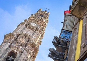 The Tower of Clerigos has a clock... on each side, which is a common feature of Baroque architecture