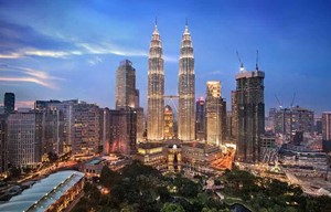 The Petronas Twin Towers reflects the eight-pointed star symbol of... culture, since 65% of the Malaysian population are Muslims